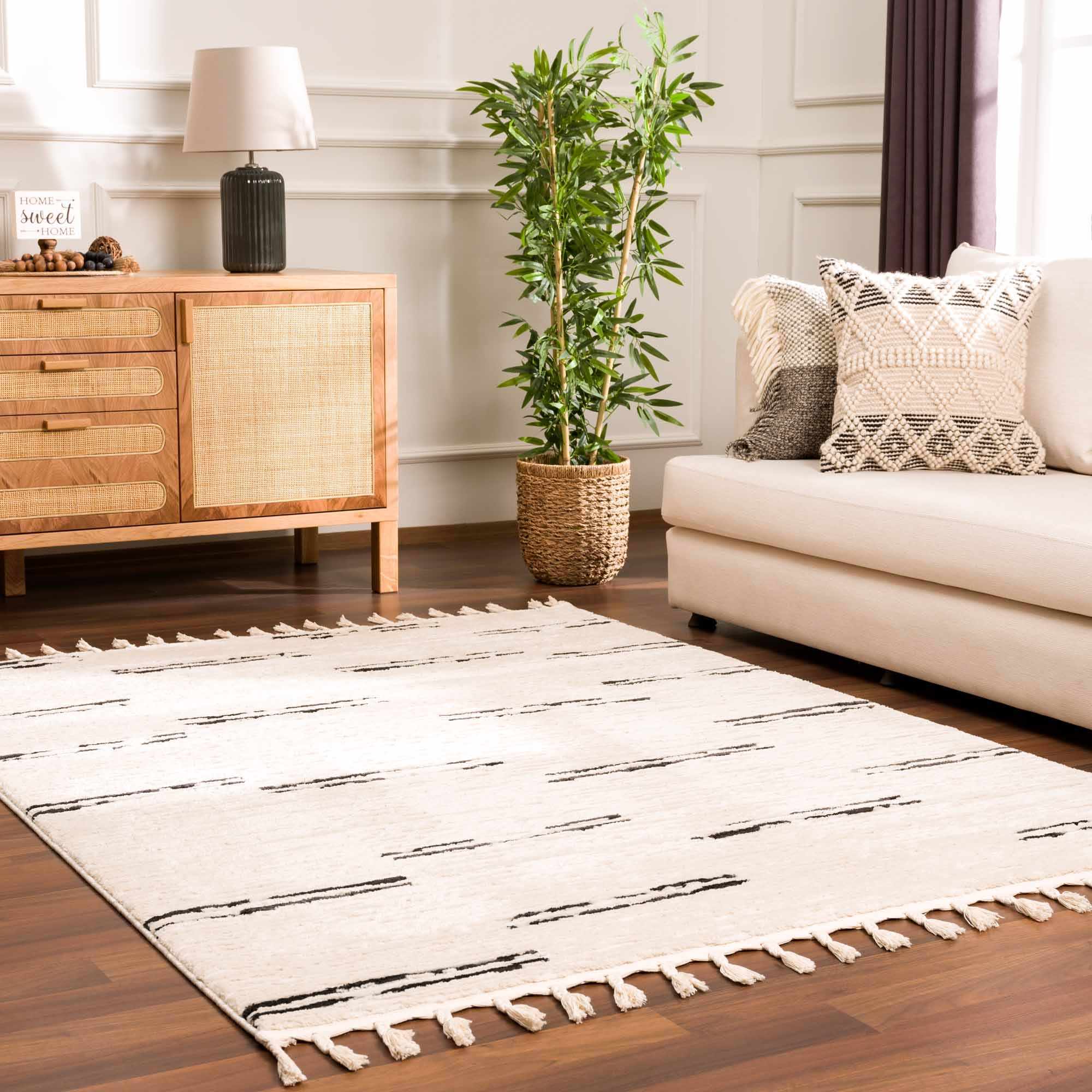 White Area Rug with Tassels